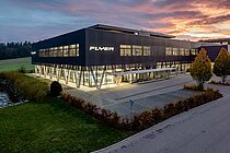 Interview Andy Kessler Flyer. Firmengebäude von Flyer mit Abendhimmel.